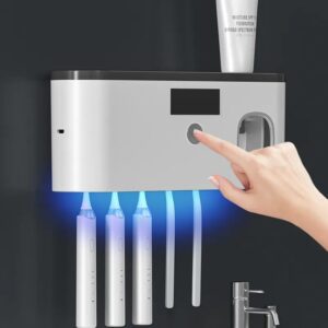 Electric toothbrush UV sterilization dispenser