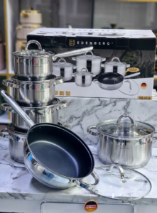 Edenberg 12-piece stainless steel cookware set with non-stick frying pan and tempered glass lids.
